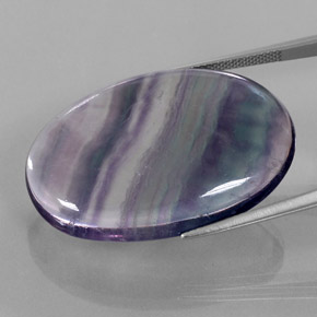 48.25캐럿 천연 멀티컬러 플루오라이트, 타원형 컷, 33.2×23.2 mm, 투명한