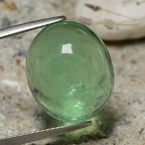 20.63ct 자연스러운 흙빛 녹색 형석, 타원형, 투명한
