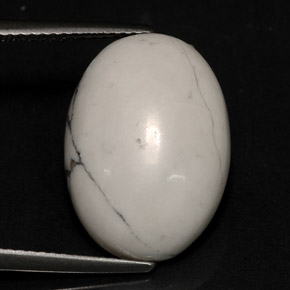 8.82캐럿 천연 회백색 하울라이트, 타원형 컷, 18.3×13.2 mm, 불투명체
