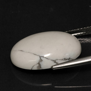 8.82캐럿 천연 회백색 하울라이트, 타원형 컷, 18.3×13.2 mm, 불투명체
