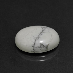 7.96캐럿 천연 회백색 하울라이트, 타원형 컷, 16.3×12.2 mm, 불투명체