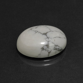 8.24캐럿 천연 회백색 하울라이트, 타원형 컷, 16.2×12.4 mm, 불투명체
