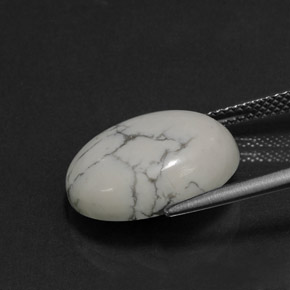 8.24캐럿 천연 회백색 하울라이트, 타원형 컷, 16.2×12.4 mm, 불투명체