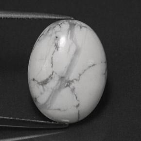 7.54캐럿 천연 회백색 하울라이트, 타원형 컷, 16.1×12.3 mm, 불투명체