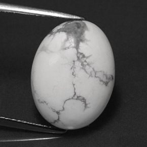 8.20캐럿 천연 회백색 하울라이트, 타원형 컷, 16.2×12.4 mm, 불투명체