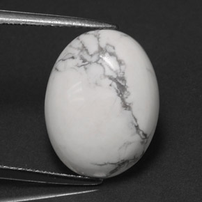 7.41캐럿 천연 회백색 하울라이트, 타원형 컷, 16.2×12.4 mm, 불투명체