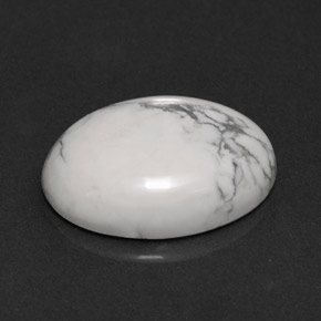 7.41캐럿 천연 회백색 하울라이트, 타원형 컷, 16.2×12.4 mm, 불투명체