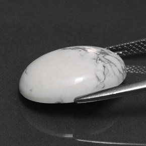 7.41캐럿 천연 회백색 하울라이트, 타원형 컷, 16.2×12.4 mm, 불투명체