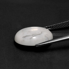 8.12캐럿 천연 회백색 하울라이트, 타원형 컷, 16.3×12.4 mm, 불투명체