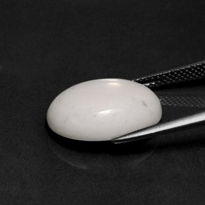 8.38캐럿 천연 회백색 하울라이트, 타원형 컷, 16.3×12.4 mm, 불투명체