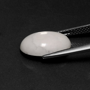 4.74캐럿 천연 회백색 하울라이트, 타원형 컷, 13.7×9.7 mm, 불투명체