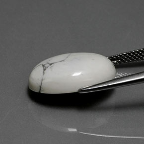9.10캐럿 천연 회백색 하울라이트, 타원형 컷, 16.7×12.8 mm, 불투명체