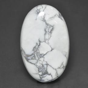 63.57캐럿 천연 회백색 하울라이트, 타원형 컷, 39.1×24.8 mm, 불투명체
