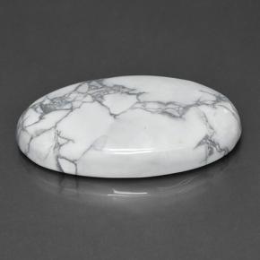 63.57캐럿 천연 회백색 하울라이트, 타원형 컷, 39.1×24.8 mm, 불투명체