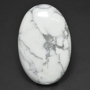 69.38캐럿 천연 여러 가지 빛깔의 흰색 하울라이트, 타원형 컷, 40.8×27.1 mm, 불투명체