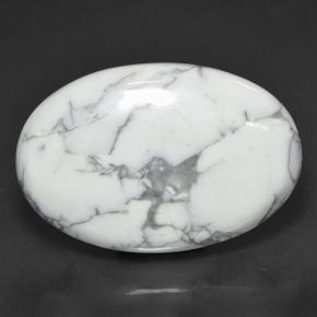 69.38캐럿 천연 여러 가지 빛깔의 흰색 하울라이트, 타원형 컷, 40.8×27.1 mm, 불투명체