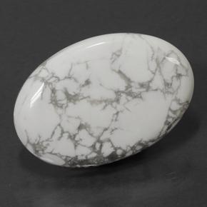 66.12캐럿 천연 여러 가지 빛깔의 흰색 하울라이트, 타원형 컷, 40.7×27.7 mm, 불투명체