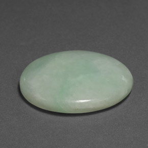 30.33캐럿 천연 파스텔 그린 경옥, 타원형 컷, 27.9×21.7 mm, 불투명체