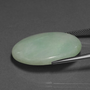 30.33캐럿 천연 파스텔 그린 경옥, 타원형 컷, 27.9×21.7 mm, 불투명체