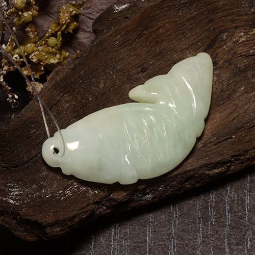 27.85캐럿 천연 회녹색 경옥, 멋진 모양, 37.3×16 mm, 투명한
