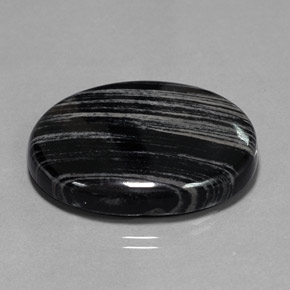 54.69캐럿 천연 회색 선이 있는 검정색 재스퍼, 타원형 컷, 32.8×26.2 mm, 불투명체