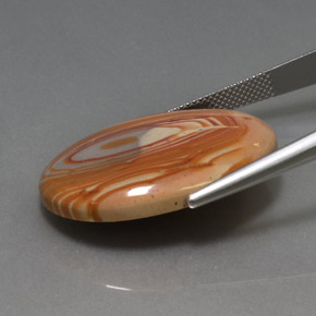 24.42캐럿 천연 멀티컬러 재스퍼, 타원형 컷, 29.9×21.9 mm, 불투명체