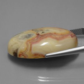 58.43캐럿 천연 멀티컬러 재스퍼, 타원형 컷, 35.3×23.3 mm, 불투명체