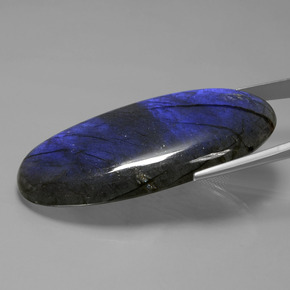 135.49캐럿 천연 그레이 블루 광택 라브라도라이트, 타원형 컷, 59.3×32.1 mm, 투명한