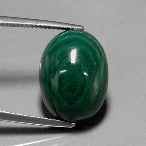 22.99캐럿 천연 여러 가지 빛깔의 녹색 말라카이트, 타원형 컷, 18.1×13.5 mm, 불투명체