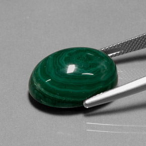 22.99캐럿 천연 여러 가지 빛깔의 녹색 말라카이트, 타원형 컷, 18.1×13.5 mm, 불투명체