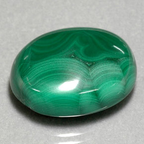 29.39캐럿 천연 여러 가지 빛깔의 녹색 말라카이트, 타원형 컷, 20.4×16.3 mm, 불투명체