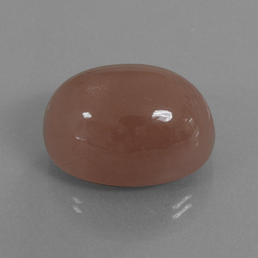 49.49캐럿 천연 붉은빛 브라운 문스톤, 타원형 컷, 25.1×18.1 mm, 불투명체