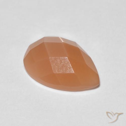 0.93ct 자연스러운 따뜻한 살구 오렌지 월장석, 배 모양, 투명한