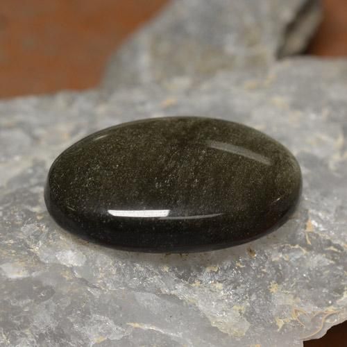 26.24캐럿 천연 골드 광택이 있는 블랙 옵시디언, 타원형 컷, 28.5×18.2 mm, 불투명체