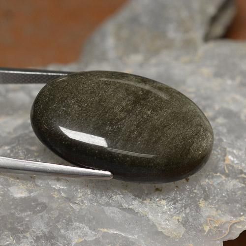 26.24캐럿 천연 골드 광택이 있는 블랙 옵시디언, 타원형 컷, 28.5×18.2 mm, 불투명체