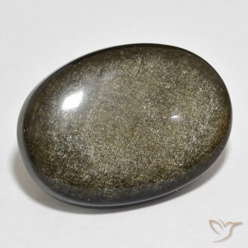 22.54ct 자연스러운 골드 광택이 있는 블랙 흑요석, 타원형, 불투명체