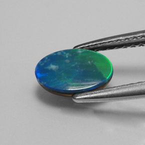 0.73캐럿 천연 다색 오팔 이중선, 타원형 컷, 불투명체