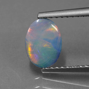 0.69캐럿 천연 다색 오팔 이중선, 타원형, 불투명체