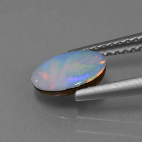 0.69캐럿 천연 다색 오팔 이중선, 타원형, 불투명체
