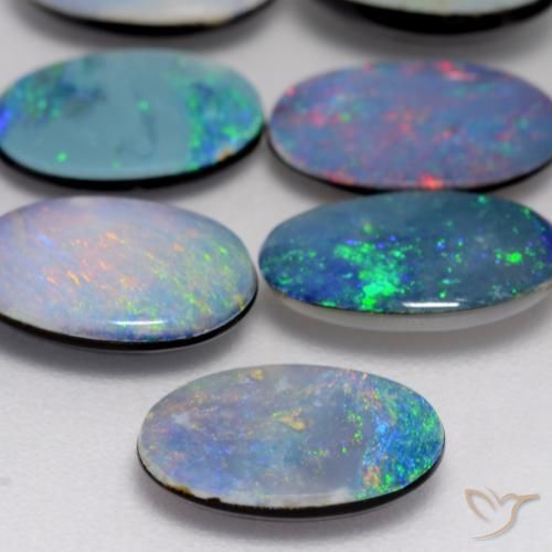 0.88캐럿 천연 다색 오팔 이중선, 타원형, 불투명체