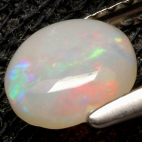 0.52캐럿 천연 멀티컬러 오팔, 라운드 컷, 6.28 mm, 불투명체