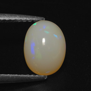 1.22캐럿 천연 멀티컬러 오팔, 타원형 컷, 8.6×6.5 mm, 투명한
