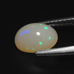 1.22캐럿 천연 멀티컬러 오팔, 타원형 컷, 8.6×6.5 mm, 투명한