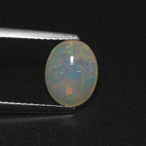 1.35캐럿 천연 멀티컬러 오팔, 타원형 컷, 9.1×7.2 mm, 투명한