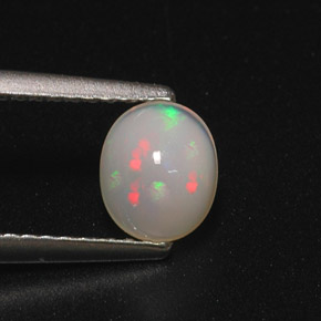 0.70캐럿 천연 멀티컬러 오팔, 타원형 컷, 6.6×5.6 mm, 투명한