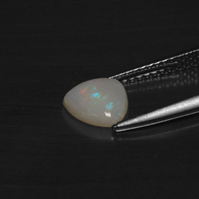 0.69캐럿 천연 멀티컬러 오팔, 트릴리언, 7.1×7 mm, 투명한