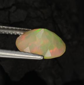 1.57캐럿 천연 멀티컬러 오팔, 타원형 컷, 10.1×8.2 mm, 투명한