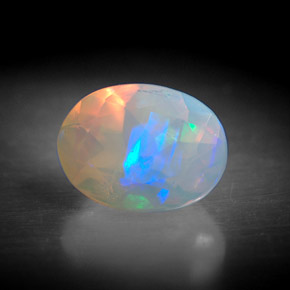 0.91캐럿 천연 멀티컬러 오팔, 투명한, 8.2×6.1 mm, 투명/반투명