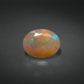 1.06캐럿 천연 멀티컬러 오팔, 투명한, 9×7 mm, 투명/반투명
