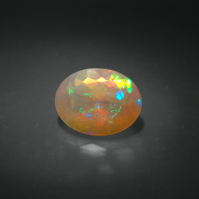 1.06캐럿 천연 멀티컬러 오팔, 투명한, 9×7 mm, 투명/반투명